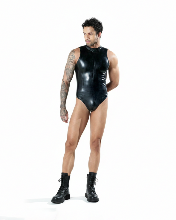 Person wearing a black leather bodysuit on a white background