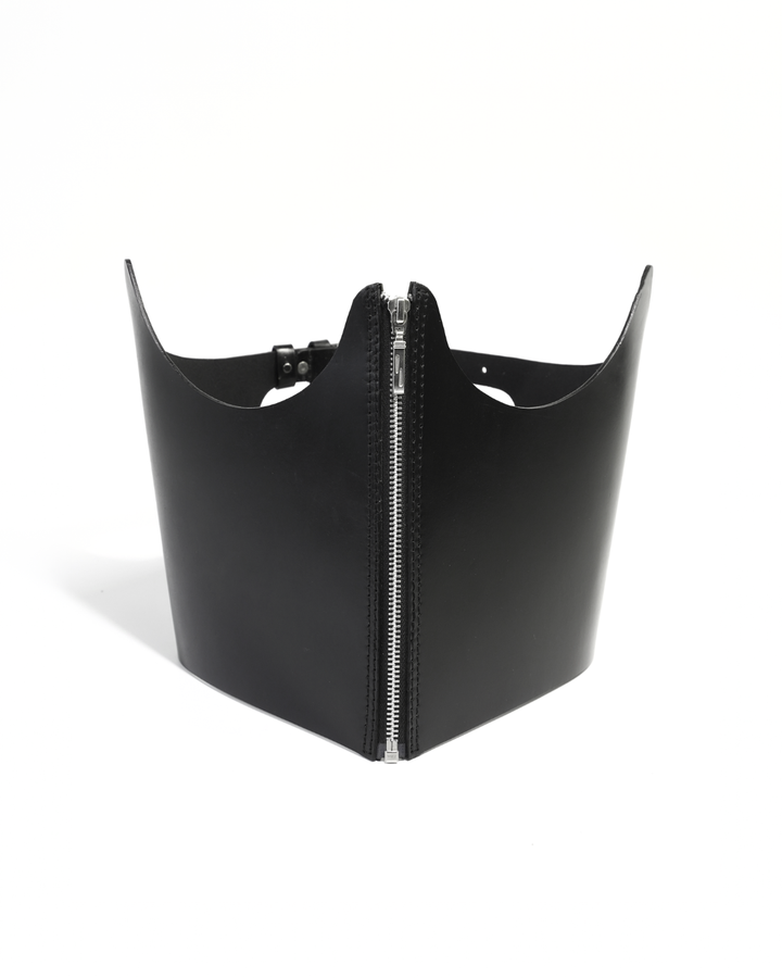 Subculture Phoenix Corset in black - front view showing structured leather body with centre silver zipper and arched wing-cut silhouette, Leathersubculture India