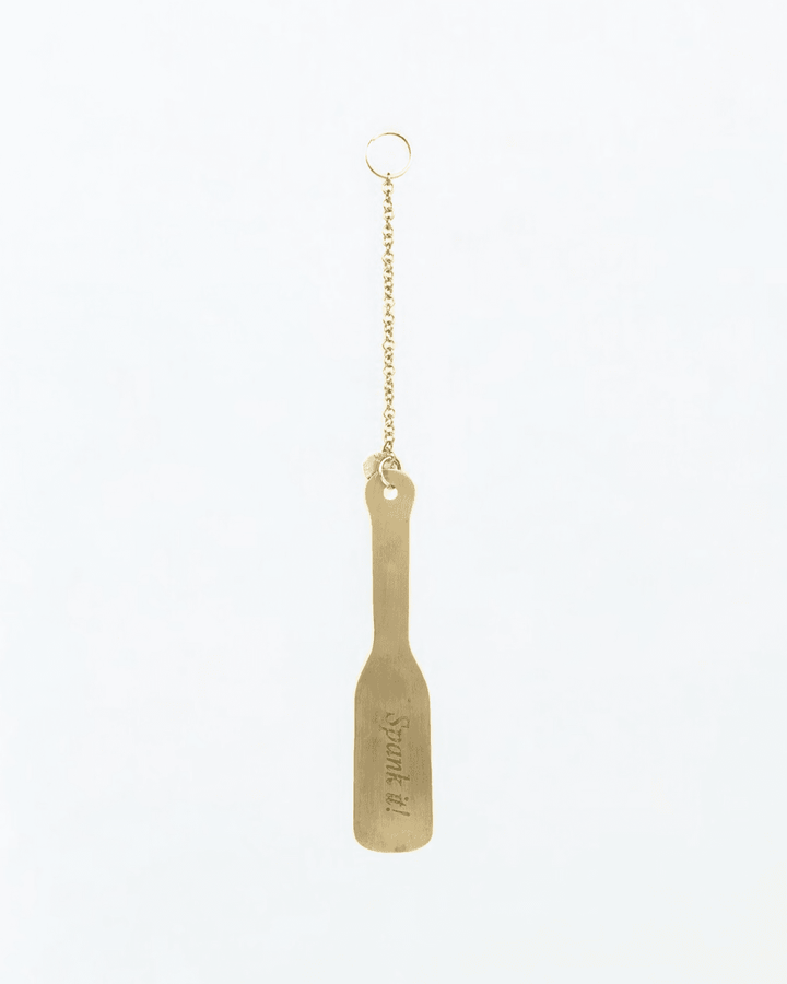 Spank it Metal Paddle Charm, metal impact toy by Subculture, detail view