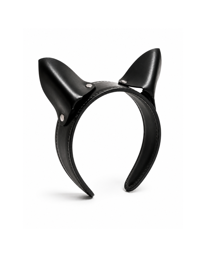 Prowl leather cat ear headband three-quarter view on white background showing stitched leather-wrapped band, padded pointed ear construction and silver dome rivets