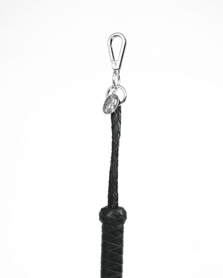 Mini Flogger Leather Charm, genuine leather impact toy by Subculture, worn view