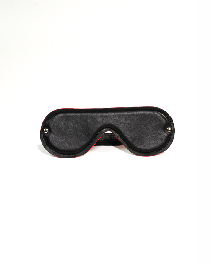 Padded leather blindfold from BDSM Bondage Kit - black leather eye mask with red edge detail and elastic band, Leathersubculture India