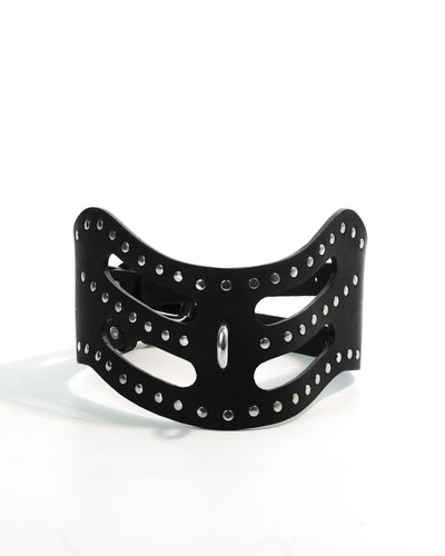 Cipher Collar — wide black leather collar with precision cut-out slots and chrome stud rivets, double buckle closure and O-ring, flat lay on white background
