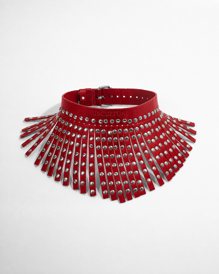 Subculture Maharaja Collar in red - flat lay showing studded red leather fringe strips with silver dome rivets and adjustable rear buckle, Leathersubculture India