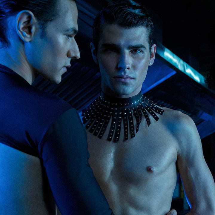 Subculture Maharaja Collar in black worn in editorial shoot - studded leather fringe necklace collar on model in blue-lit studio setting, Leathersubculture