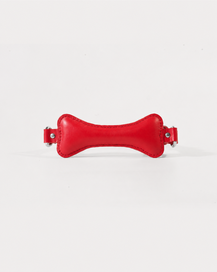 Fetch leather bone gag in red full grain leather, front view showing padded bite piece
